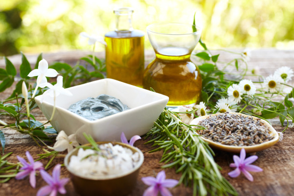 Still-life-of-herbs-massage-oil-mud-mask-rosemary-salt-155145929_1255x837